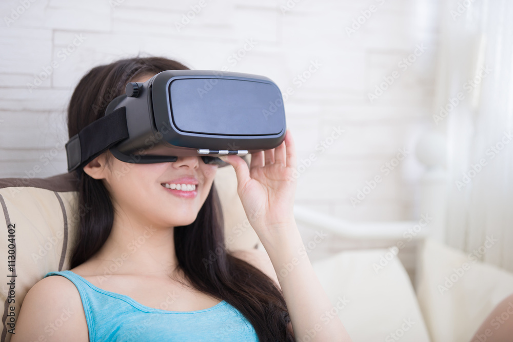 woman using VR headset glasses woman using VR headset glasses