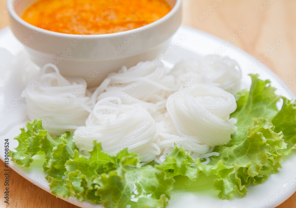 Rice noodles in fish curry sauce with vegetables Rice noodles in fish curry sauce with vegetables