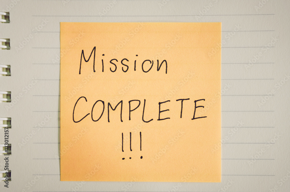 Fotografie Mission complete words on paper