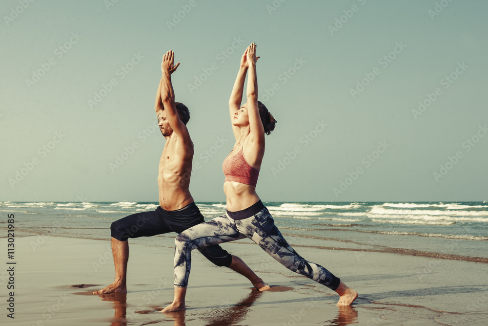 Obraz premium Yoga Exercise Active Beach Outdoor Concept