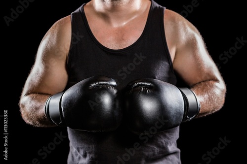 Mid section of muscular boxer © WavebreakmediaMicro