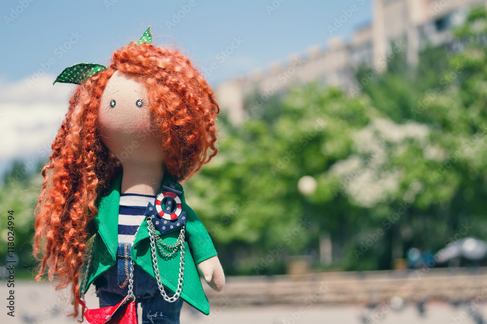 handmade doll with curly red hair