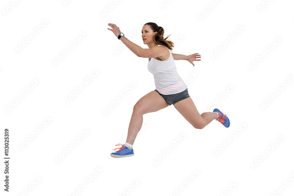 Athletic woman running on white background