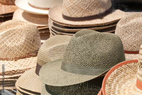 Straw hats for sale on a table