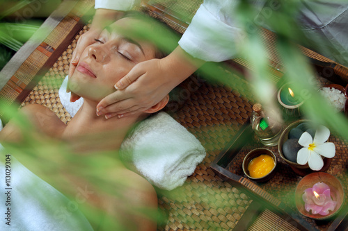 portrait of young beautiful woman in spa environment