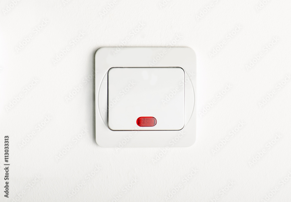 White light switch on/off on white wall with red led White light switch on/off on white wall with red led