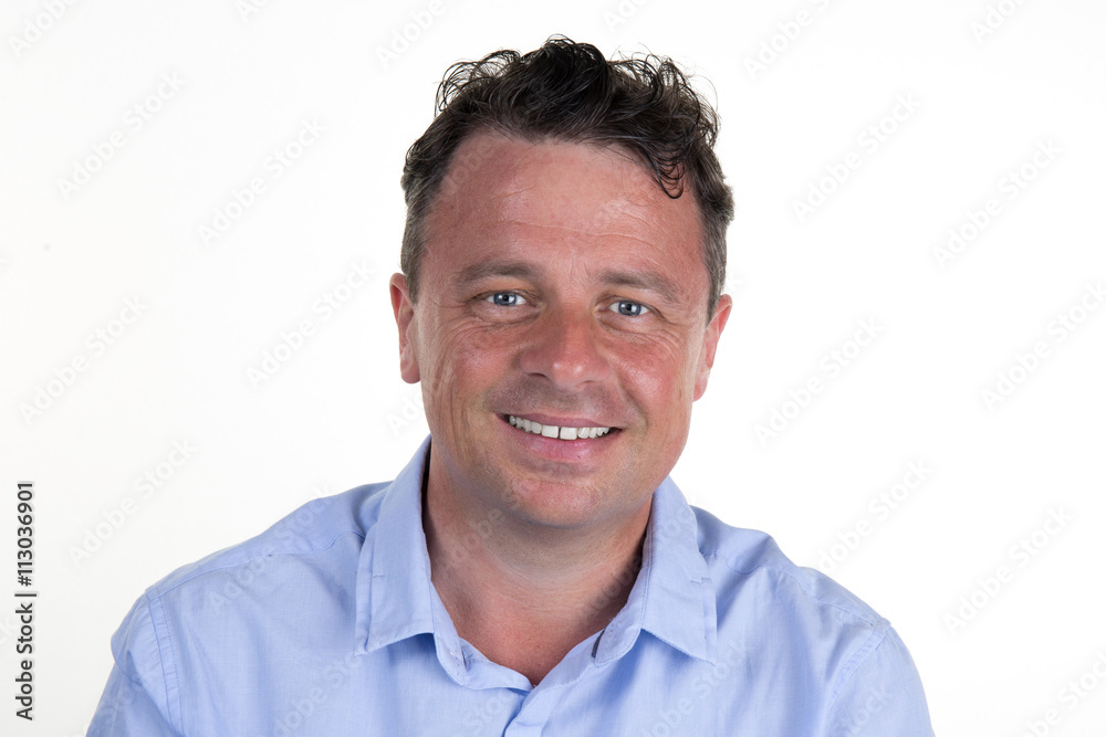 Happy and cheerful man smiling confidently isolated on white Happy and cheerful man smiling confidently isolated on white