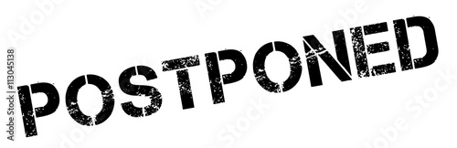 Postponed black rubber stamp on white