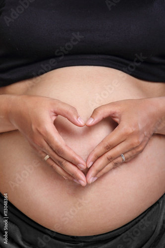Wallpaper Mural Mother's love for her baby, hand symbol Torontodigital.ca