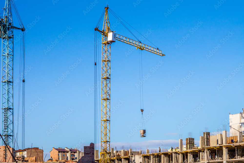 Crane against the blue sky. Crane against the blue sky.