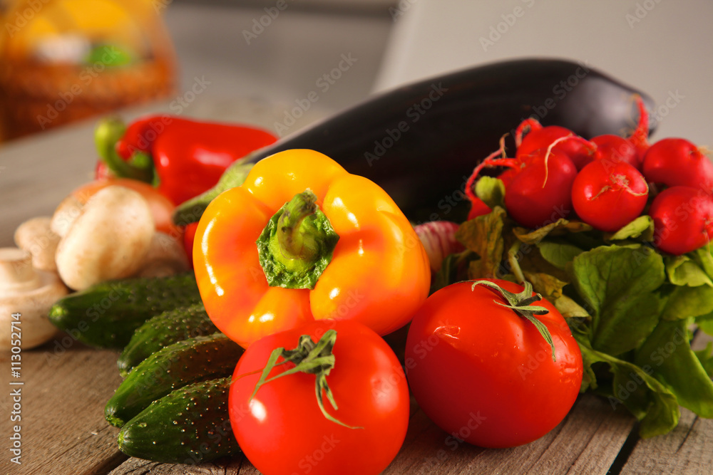 Fresh vegetables on a clean wooden table