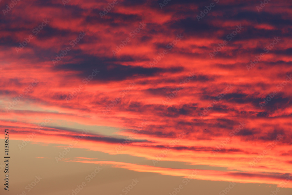 Red dawn clouds, Cornwall, England, UK.