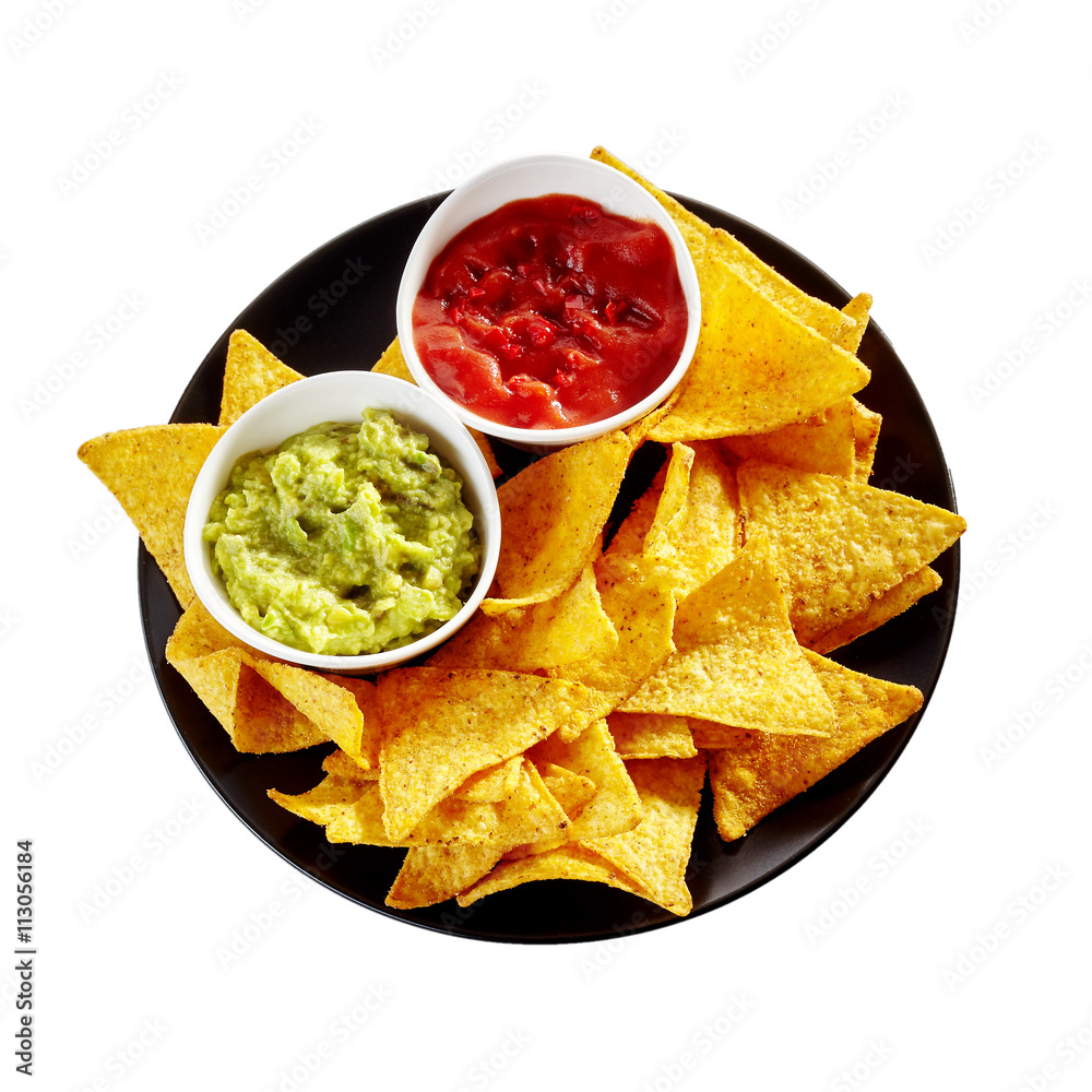 Isolated plate of nachos, salsa and guacamole