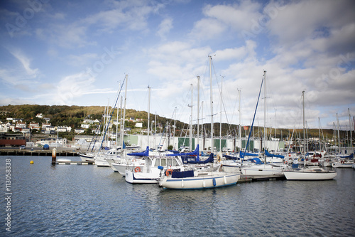 FECAMP, FRANCE - APRIL 8, 2015: Town and Ships in Port at Fecamp