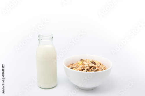 Delicious and healthy cereal in bowl with milk. Morning breakfas