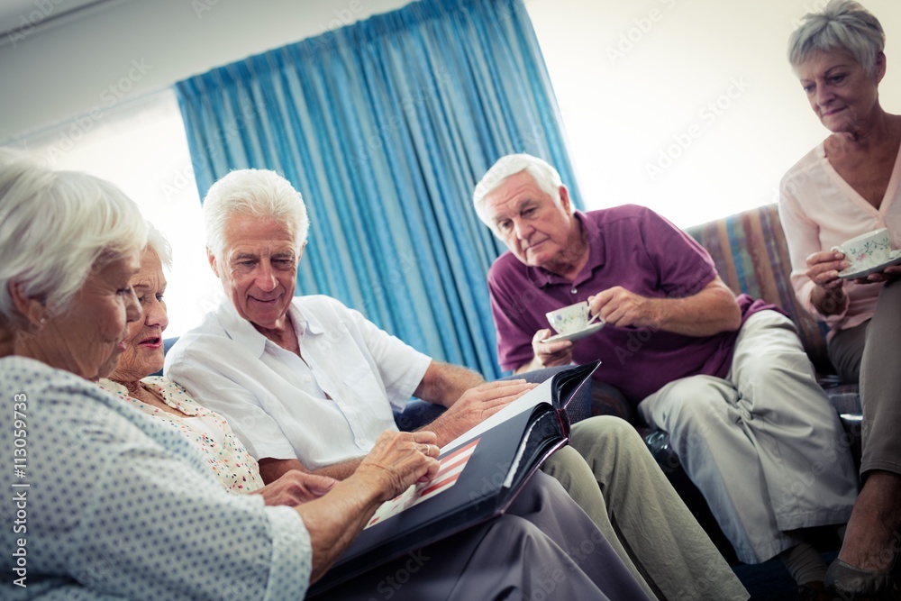Seniors looking at pictures Seniors looking at pictures