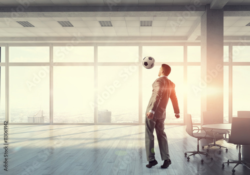 Playing football in office