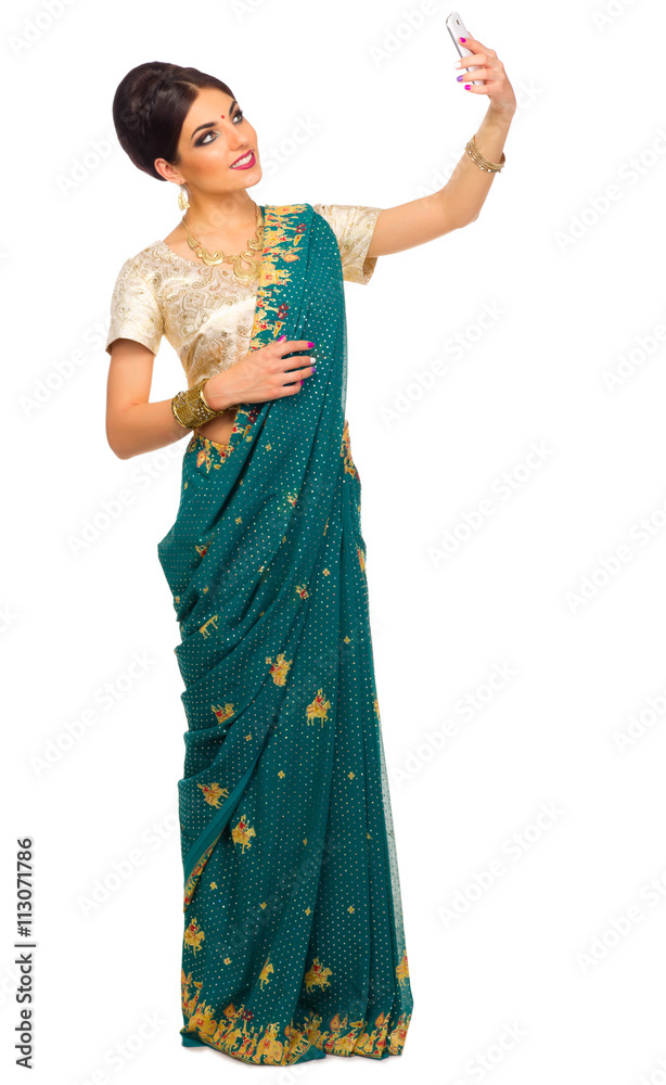Indian woman with mobile phone Indian woman with mobile phone