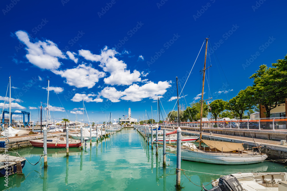 pier with buildings and boats