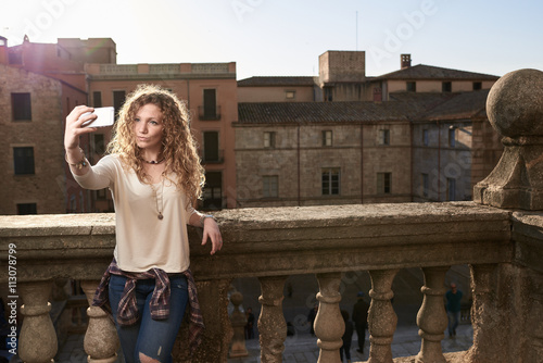 Stylish Girl Taking Selfie photo