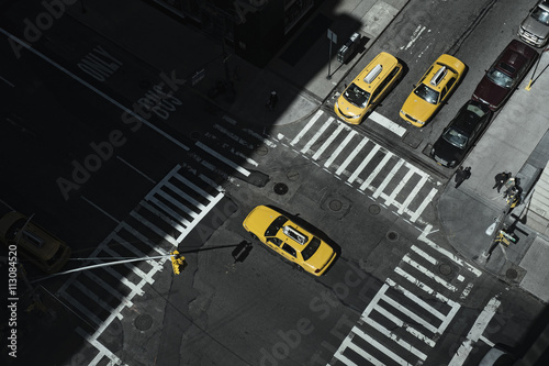 Taxi at crossing in Manhattan, New York, USA photo