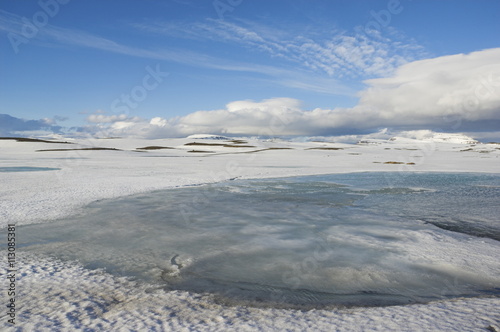 Ice and snow across the Fellabaer range near Seydisfjordur, North East area, Iceland photo