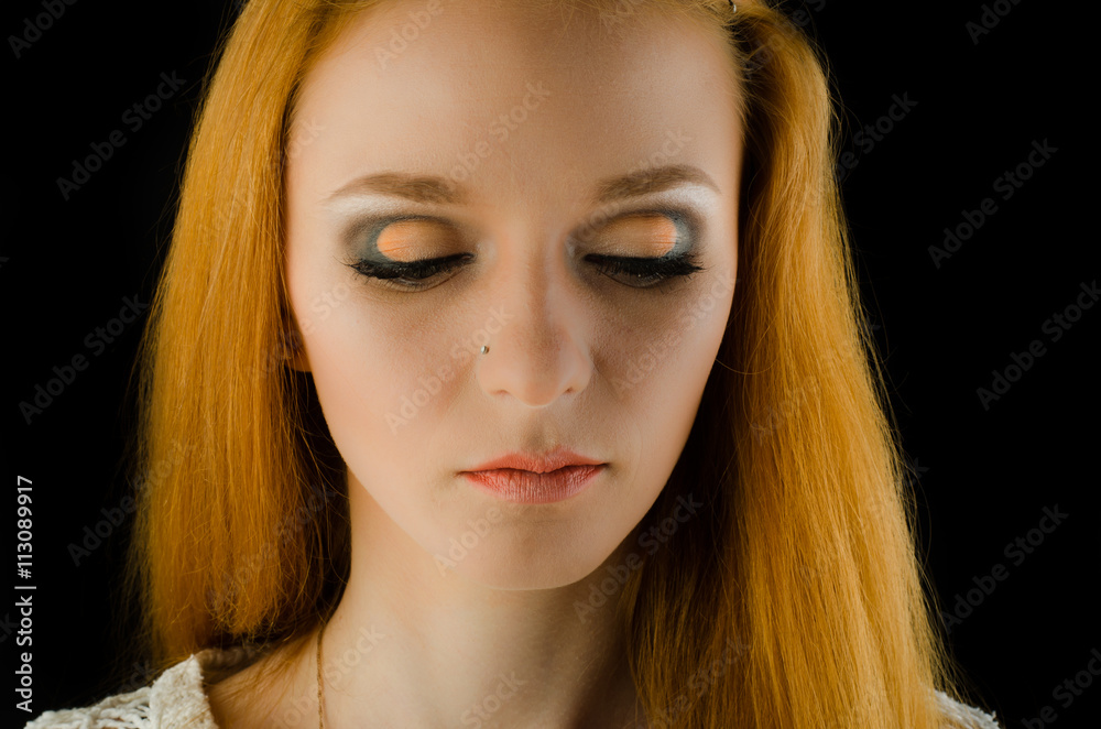 Perfect portrait  red-hair girl in the studio
