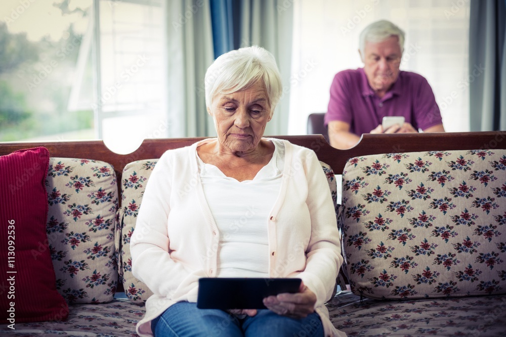 Senior woman using digital tablet Senior woman using digital tablet