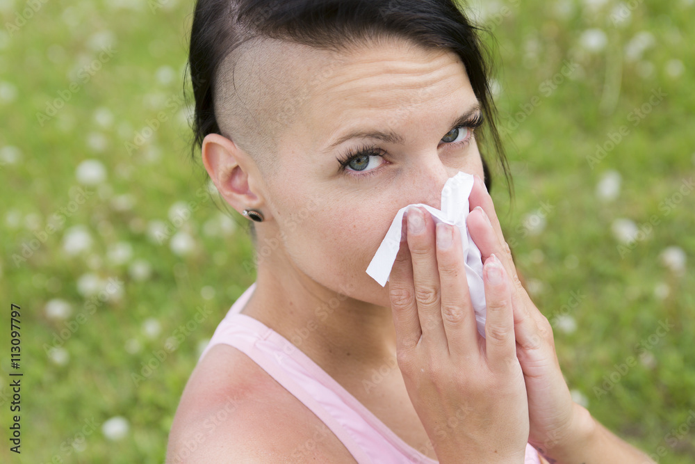 young woman suffering spring pollen allergy young woman suffering spring pollen allergy