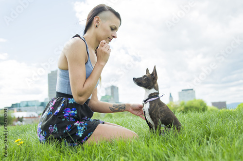 girl with a dog in the park