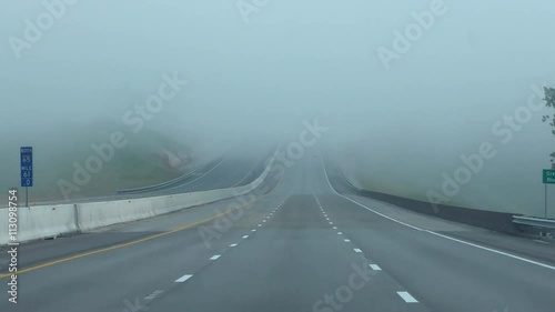 driving on a foggy road 