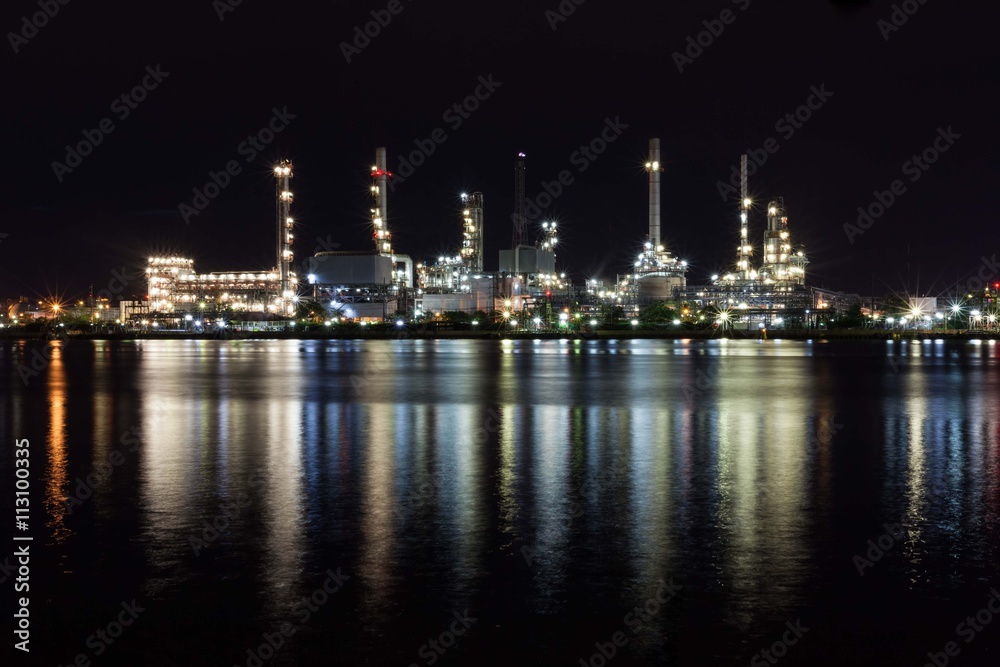 Beautiful light of oil refinery factory in night time.