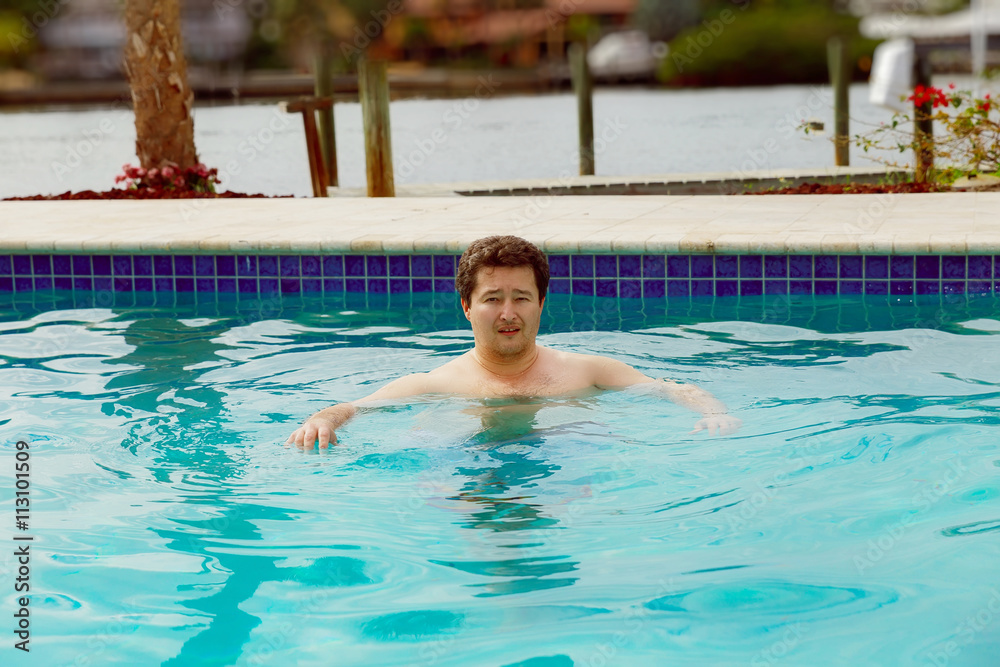 Poolman swimming in the pool