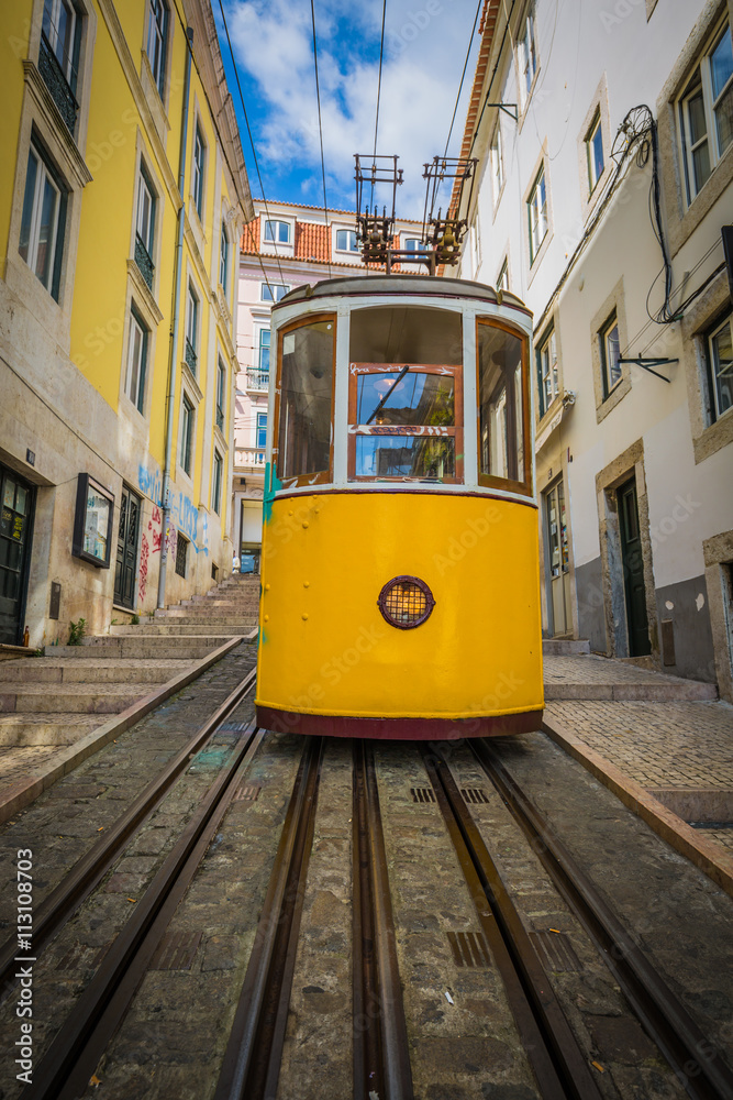 Romantic yellow tramway - main symbol of Lisbon, Portugal