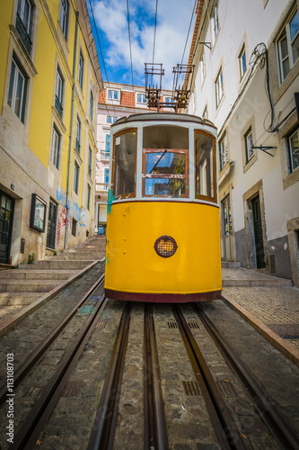 Romantic yellow tramway - main symbol of Lisbon, Portugal