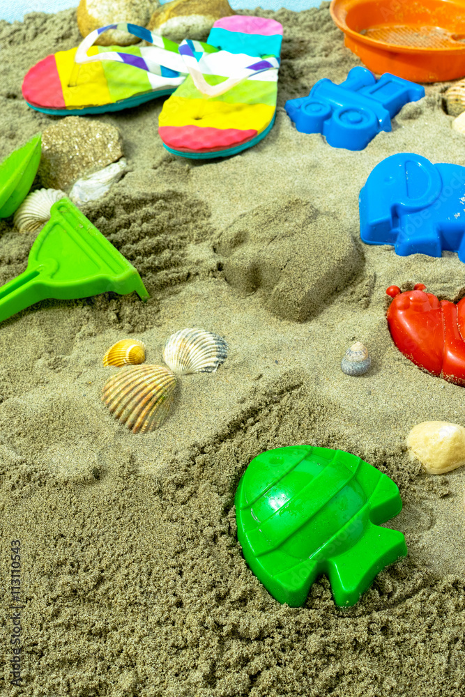 Obraz premium Beach toys in the sand