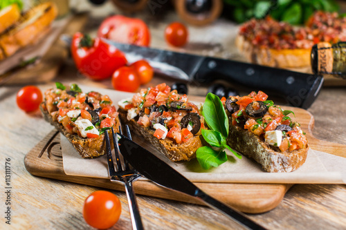Beautiful fresh sandwiches with feta cheese, tomatoes and Basil