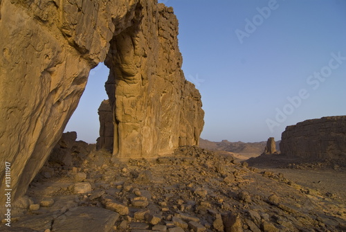 Giant rock arch in the region of Tasset, 250 km north of Djanet, Southern Algeria photo