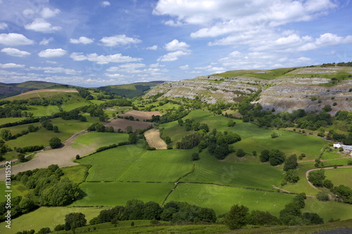 View towards limestone escarpment of Creigiau Eglwyseg, from Castell Dinas Bran, Llangollen, Denbighshire, Wales photo