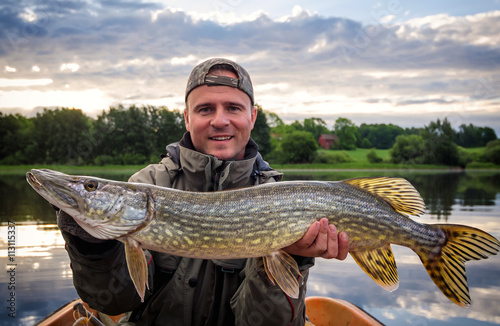 Portrait with huge pike