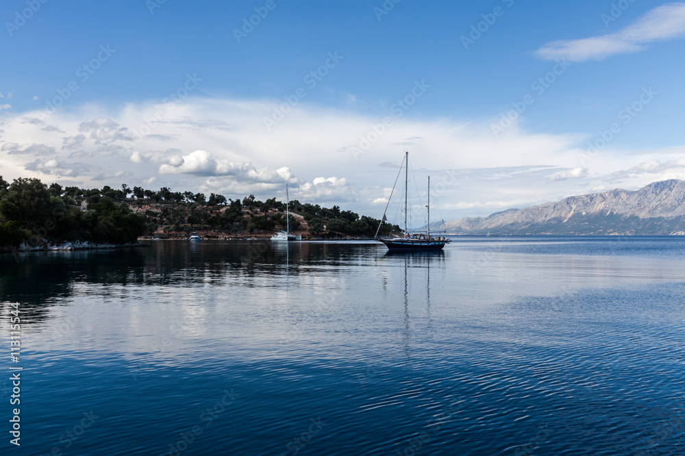 Sailing boat in the blue lagoon, Lefkada Island, Greece