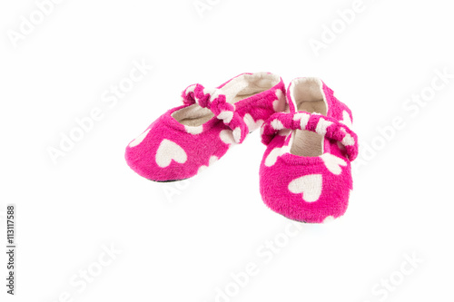 white  heart in pink  room  slippers on white background