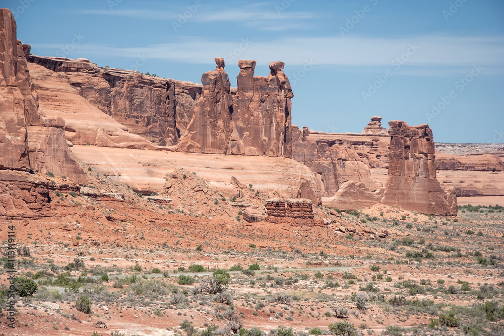 View of Three Gossips along North Park Avenue in Arches National Park, Utah,  USA