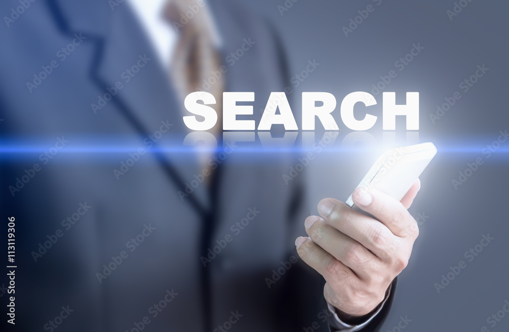Businessman pressing hand SEARCH message on virtual screen. Can bring to the medium of your ad. Businessman pressing hand SEARCH message on virtual screen. Can bring to the medium of your ad.