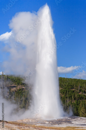 Old Faithful Geyser and Fountain at Yellowstone National Park, Wyoming, USA