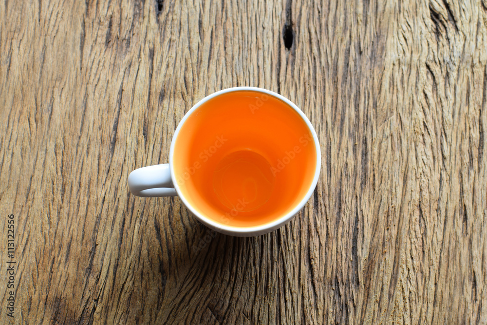 Empty coffee or tea cup on grunge wooden background Empty coffee or tea cup on grunge wooden background