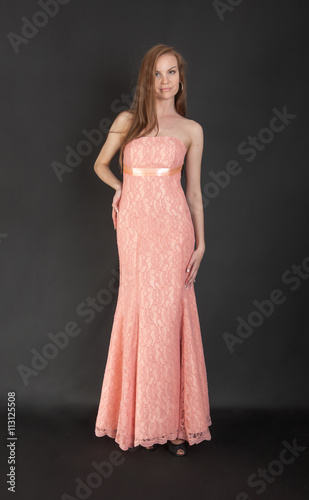 girl in a pink evening dress