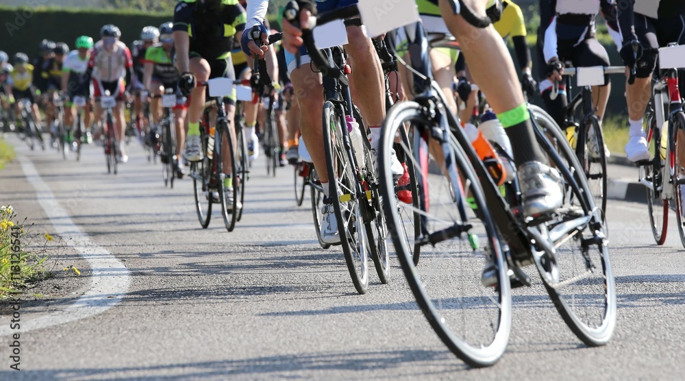 bike and professional cyclists during the cycling race on asphal bike and professional cyclists during the cycling race on asphal