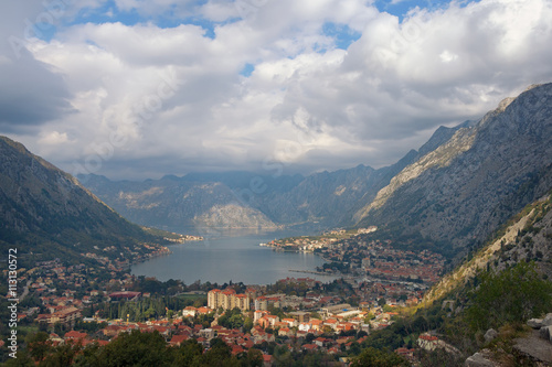 Autumn in Montenegro. View of Kotor city. Rays of light through the clouds