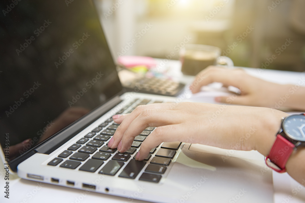 Image of female hands typing. Selective focus. Image of female hands typing. Selective focus.